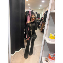 Jumpsuit asimmetrico con manicotto